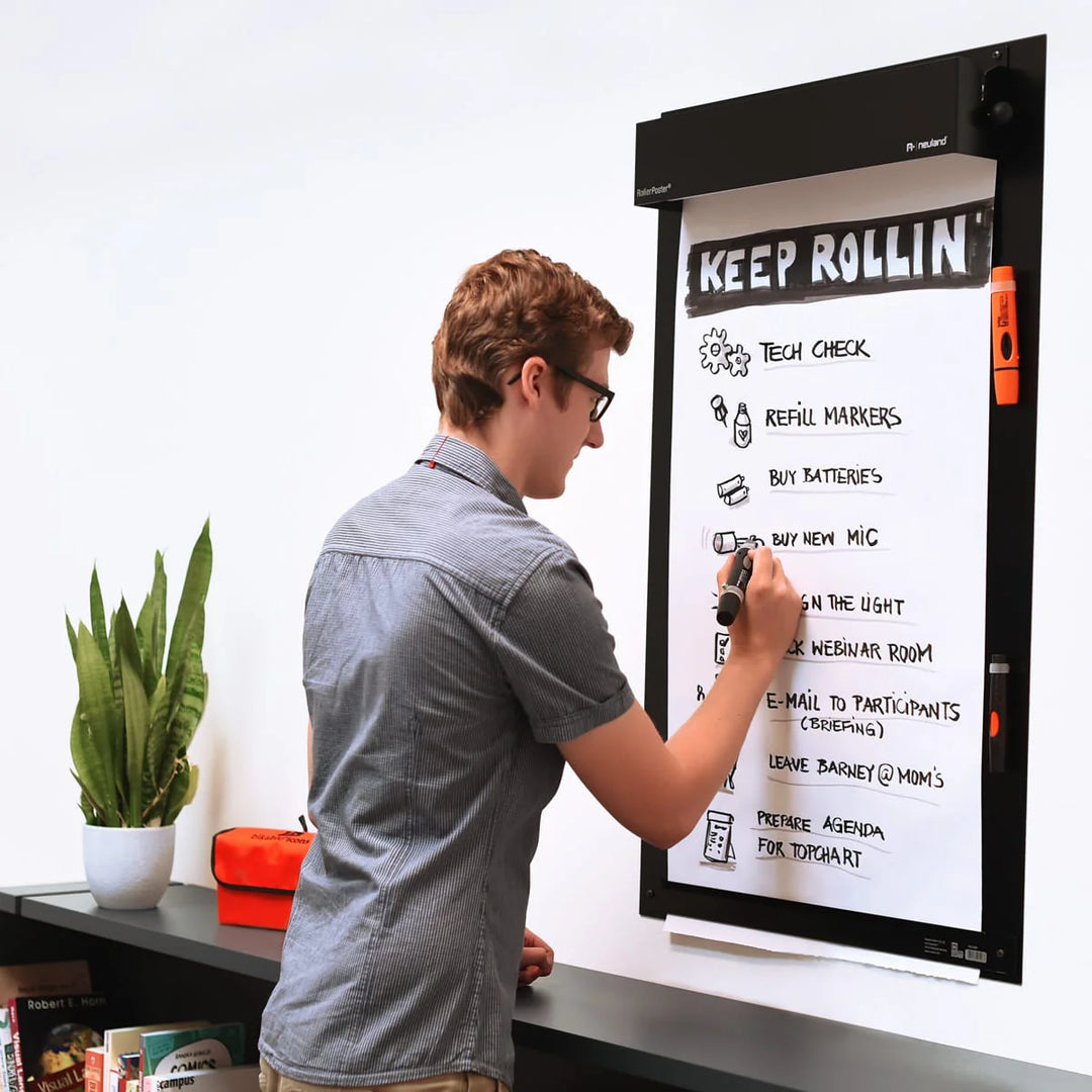 Neuland RollerPoster®, wall-mounted roller flipchart for use on home wall, office/meeting wall or for online training. Available with black and white paper rolls. Sold in the UK by Neuland re-seller Inky Thinking 