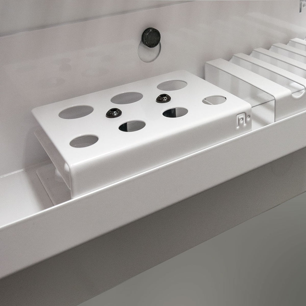 Refill Station is a sturdy white refill station that allows for quick and clean refilling of your Neuland markers with refill ink