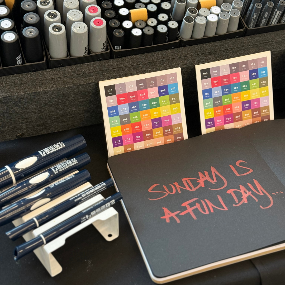 Neuland 4-2 Sketch Pad with black, white, grey and brown paper sheets in one pad. 