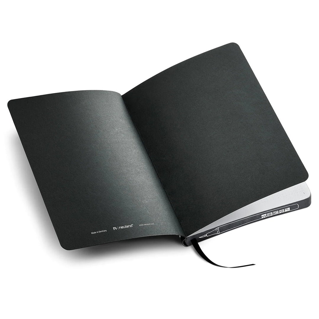 BulletJournal note pad with black covers and white dotted pages.  Neuland products sold in the UK by official reseller, Inky Thinking.