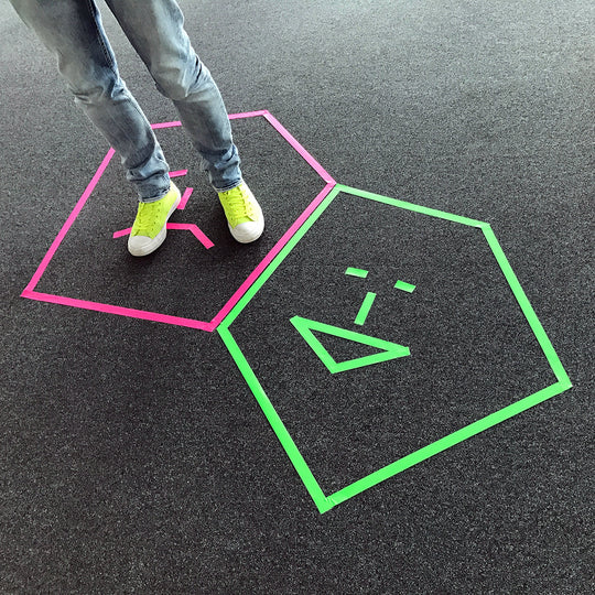 Neuland Floor Tape, green and pink shapes taped to office wall. Tape  for art projects, meeting facilitation, graphic illustrations. Sold in UK via Inky Thinking GB Shop. Official Reseller. 